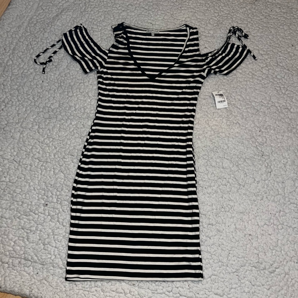 Two small dresses sold together! Never worn! Tags attached!